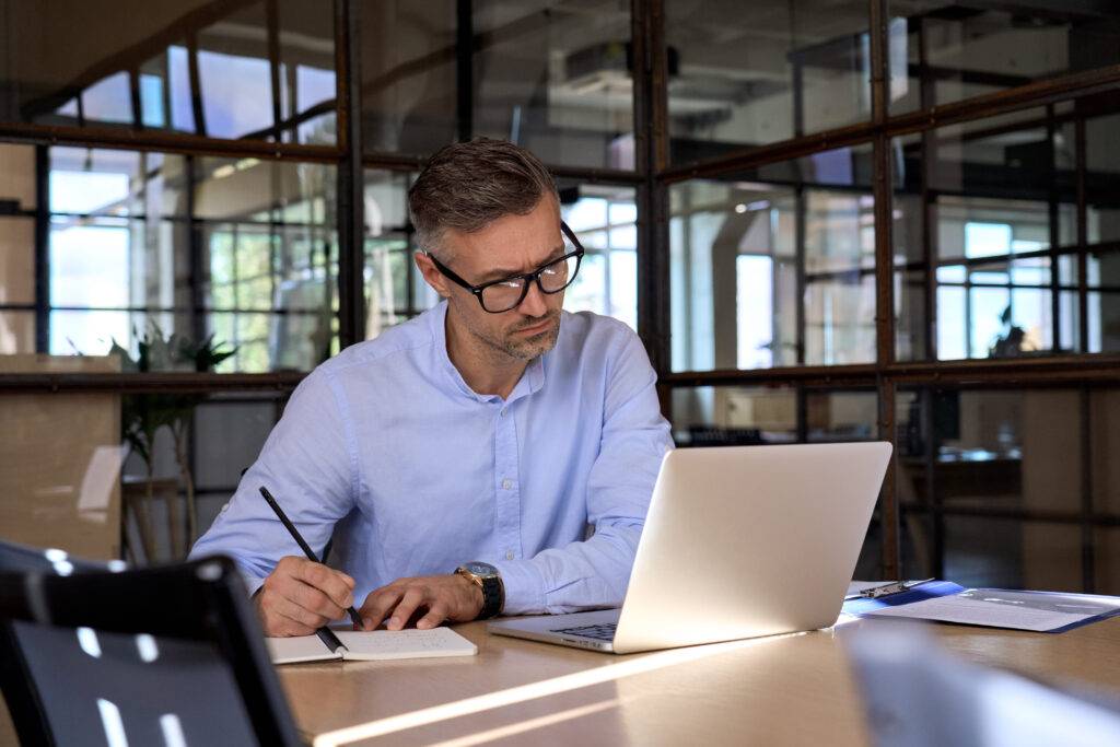 man working at laptop